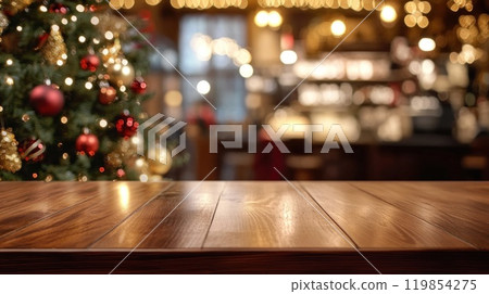 Empty wooden tabletop on blurred background of cozy cafe decorated for Christmas 119854275