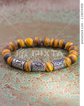 Black Obsidian stone bracelet , Chinese men's modern retro style fashion. Isolated on white background 119854499