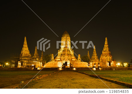 Night scene with lighting-up of Wat Chaiwatthanaram, the ancient royal temple in Ayuthaya Historical Park, a UNESCO world heritage site in Thailand. Night scene with lighting-up of Wat Chaiwatthanaram, the ancient royal temple in Ayuthaya Historical Park, a UNESCO world heritage site in Thailand. 119854835
