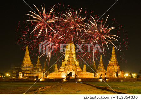 Fireworks with lighting-up of Wat Chaiwatthanaram, the ancient royal temple in Ayuthaya Historical Park, a UNESCO world heritage site in Thailand. Fireworks with lighting-up of Wat Chaiwatthanaram, the ancient royal temple in Ayuthaya Historical Park, a UNESCO world heritage site in Thailand. 119854836
