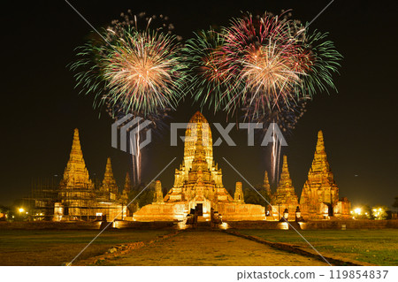 Fireworks with lighting-up of Wat Chaiwatthanaram, the ancient royal temple in Ayuthaya Historical Park, a UNESCO world heritage site in Thailand. Fireworks with lighting-up of Wat Chaiwatthanaram, the ancient royal temple in Ayuthaya Historical Park, a UNESCO world heritage site in Thailand. 119854837