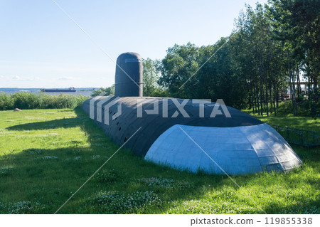 art object, a full-size model of a nuclear submarine on a lawn in a park in Kronstadt 119855338