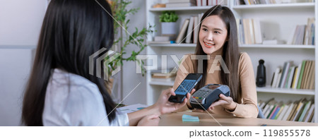 QR code payment, customer using smartphone for paying at shop. Customer paying with qr code on smartphone screen  payment technology at shop 119855578