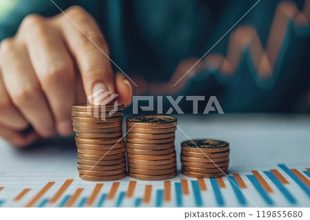 Stacking Coins Close Up with Financial Background 119855680