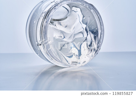 Texture of the gel in the jar. Hair gel or hyaluronic gel for the face. 119855827