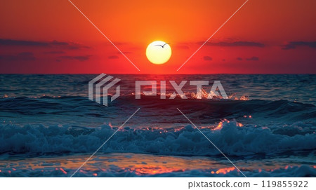 The sun is setting over the ocean, casting a warm glow on the water The sun is setting over the ocean, casting a warm glow on the water 119855922