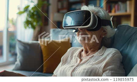Serene Senior Woman Engaging with Virtual Reality Experience in Contemporary Living Room. Serene Senior Woman Engaging with Virtual Reality Experience in Contemporary Living Room. 119855975