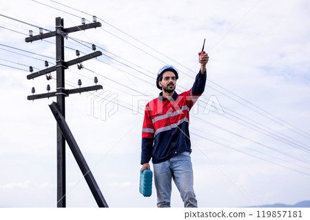 Electrical engineer man checking Power at Contruction Site. electrical engineer inspect the electrical systems at the equipment site 119857181