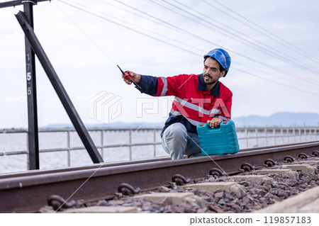 Electrical engineer man checking Power at Contruction Site. electrical engineer inspect the electrical systems at the equipment site Electrical engineer man checking Power at Contruction Site. electrical engineer inspect the electrical systems at the equipment site 119857183