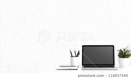 Minimalistic home office desk setup featuring laptop Minimalistic home office desk setup featuring laptop 119857340