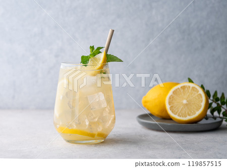 Mojito cocktail with fresh lemon, mint and ice. Refreshing citrus lemonade drink  119857515