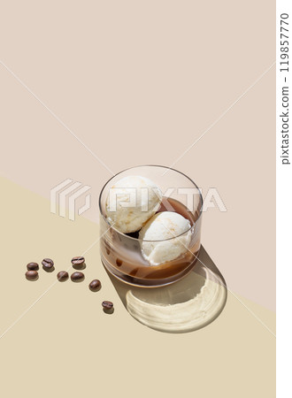 Affogato coffee with vanilla ice cream scoops  and espresso in a glass on a light background 119857770