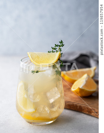 Mojito cocktail with fresh lemon, mint and ice. Refreshing citrus lemonade drink  119857954