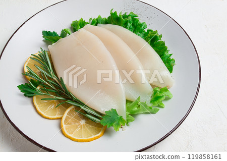Fresh body, squid, raw, three carcasses, top view, no people , on a plate, 119858161