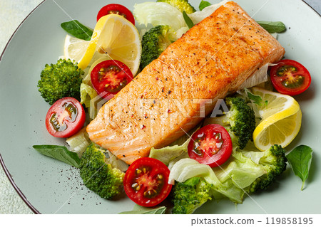 grilled salmon fillet, with vegetables, broccoli, cherry, iceberg lettuce, spices and herbs, homemade, no people, grilled salmon fillet, with vegetables, broccoli, cherry, iceberg lettuce, spices and herbs, homemade, no people, 119858195
