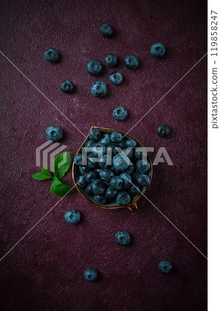 Fresh berries, Blueberries, on a maroon background, food concept, vertical, no people, Fresh berries, Blueberries, on a maroon background, food concept, vertical, no people, 119858247