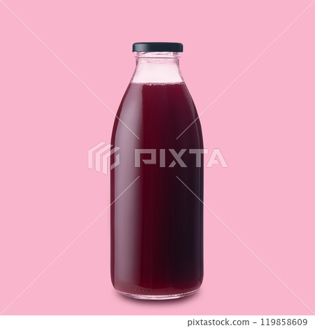 Berry fruit juice of red color in a glass bottle on an isolated pink background. Berry fruit juice of red color in a glass bottle on an isolated pink background. 119858609