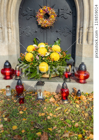 Decorated graves at a cemetery on All Saints Day (Wszystkich Swietych) in Poland. 119859014
