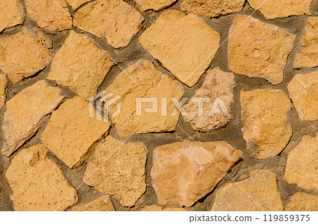 Stone wall texture background with different sized stones 119859375