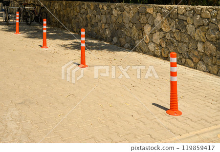 Sidewalk anti-parking bollards with reflective tape in the parking lot 11 Sidewalk anti-parking bollards with reflective tape in the parking lot 11 119859417