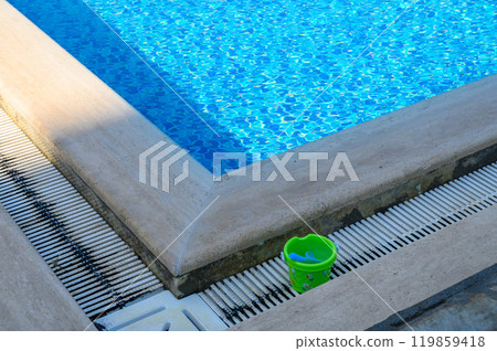 Edge of outdoor swimming pool for background 119859418