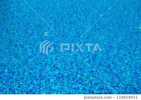 Blue water texture with light reflection. Water surface with rings and ripples, splashes and bubbles 119859431