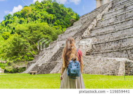 Female tourist exploring the ancient pyramids of Palenque, Mexico, surrounded by dense jungle. Cultural heritage and adventure travel concept Female tourist exploring the ancient pyramids of Palenque, Mexico, surrounded by dense jungle. Cultural heritage and adventure travel concept 119859441