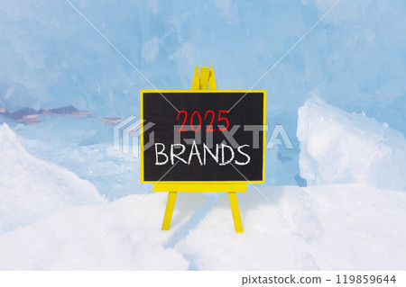 Planning 2025 brands new year symbol. Concept words 2025 Brands on beautiful yellow chalk blackboard. Beautiful Baikal lake blue ice background. Business 2025 brands new year concept. Copy space. 119859644