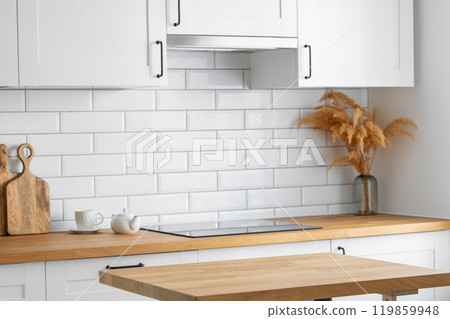 Wooden oak tabletop with free space for displaying or advertising a product Wooden oak tabletop with free space for displaying or advertising a product 119859948