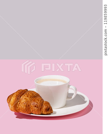 Coffee cup and fresh croissant on a white plate on a pink background. 119859993