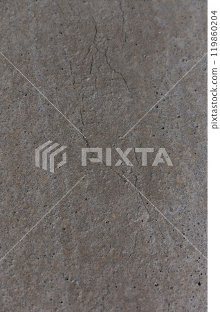 Subtle textures of cracked concrete showcase nature\'s artistry in a muted, modern space, revealing the beauty of imperfection Subtle textures of cracked concrete showcase nature\'s artistry in a muted, modern space, revealing the beauty of imperfection 119860204