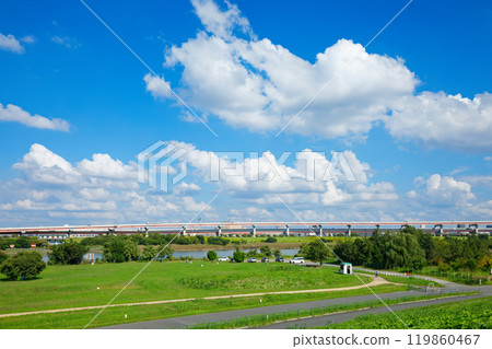 Looking towards the Metropolitan Expressway Katsushika Kawaguchi Line under the clear blue sky from the banks of the Arakawa River 119860467