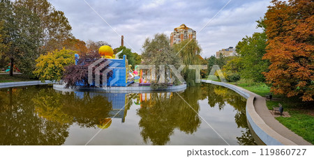 Victory Park in Odessa. In the center of the park there is a pond stocked with fish, on the island of which children's attractions are located. 119860727