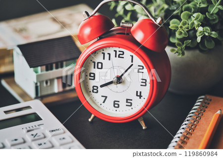 Red clock and real estate business image Red clock and real estate business image 119860984