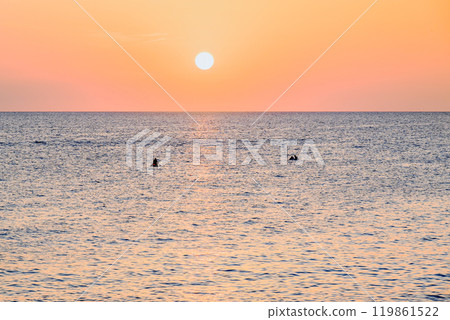 Beautiful sunset with orange sky on the beach of Menorca, Balearic Islands. Sunset, nature 119861522