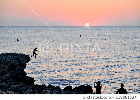Beautiful sunset with orange sky on the beach of Menorca, Balearic Islands. Sunset, nature 119861524
