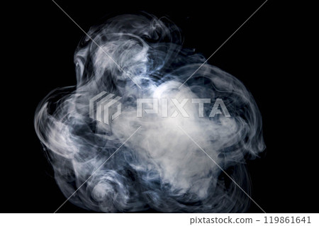 Smoke or steam blowing in the wind on a black background 119861641