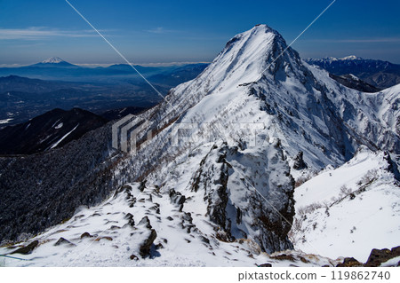 Mt. Akadake and Mt. Fuji seen from Yatsugatake mountain range and Yokodake ridgeline in severe winter Mt. Akadake and Mt. Fuji seen from Yatsugatake mountain range and Yokodake ridgeline in severe winter 119862740