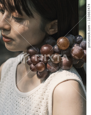 Woman with grape 119863474
