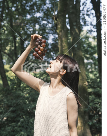 Woman with grape Woman with grape 119863477