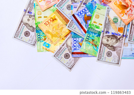 Kazakhstan tenge an American dollar are two denominations of national currency bank notes that are used in international financial transactions 119863483