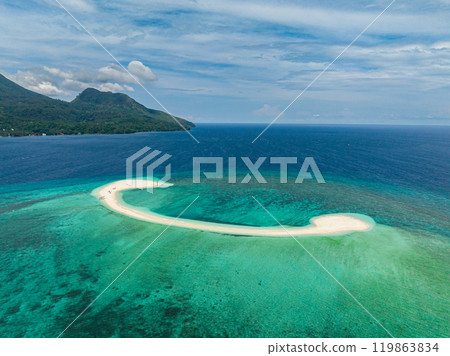 Clear greenish water in White Island. Blue sea and waves. Camiguin, Philippines. 119863834