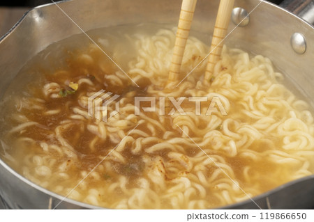 Boil instant noodles and add powdered soup Boil instant noodles and add powdered soup 119866650