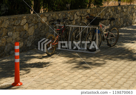 Sidewalk anti-parking bollards in the parking lot Sidewalk anti-parking bollards in the parking lot 119870063