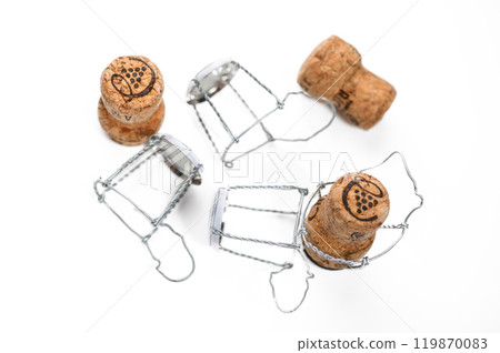 Minimal summer layout with bottle cap from sparkling wine and metal wire muselet, top view Minimal summer layout with bottle cap from sparkling wine and metal wire muselet, top view 119870083