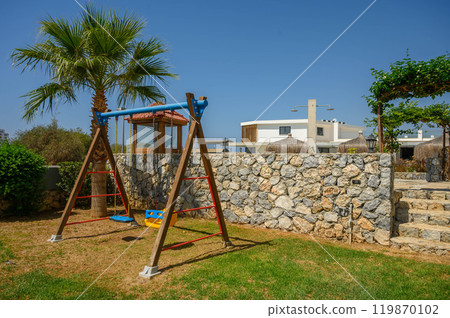 children's playground near the pool in Cyprus children's playground near the pool in Cyprus 119870102