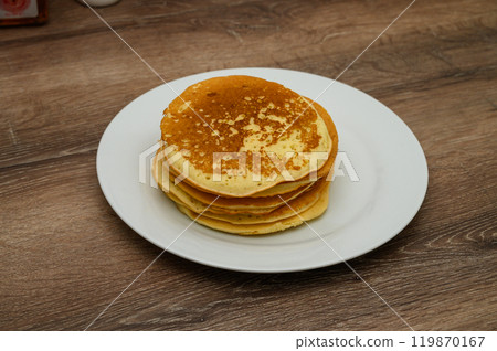 Delicious pancakes on a wooden table Delicious pancakes on a wooden table 119870167