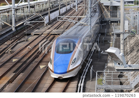 An upbound Shinkansen train leaving Honjo-Waseda Station An upbound Shinkansen train leaving Honjo-Waseda Station 119870263
