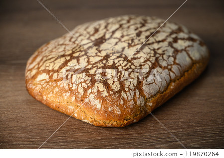 Freshly baked wheat bread, homemade cakes, still life with bread 119870264