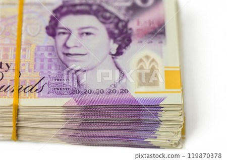 UK pound,money of United kingdom close up on white, Pound UK note 119870378